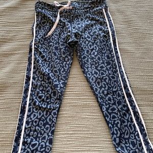 The Upside leopard print leggings. Navy and gray